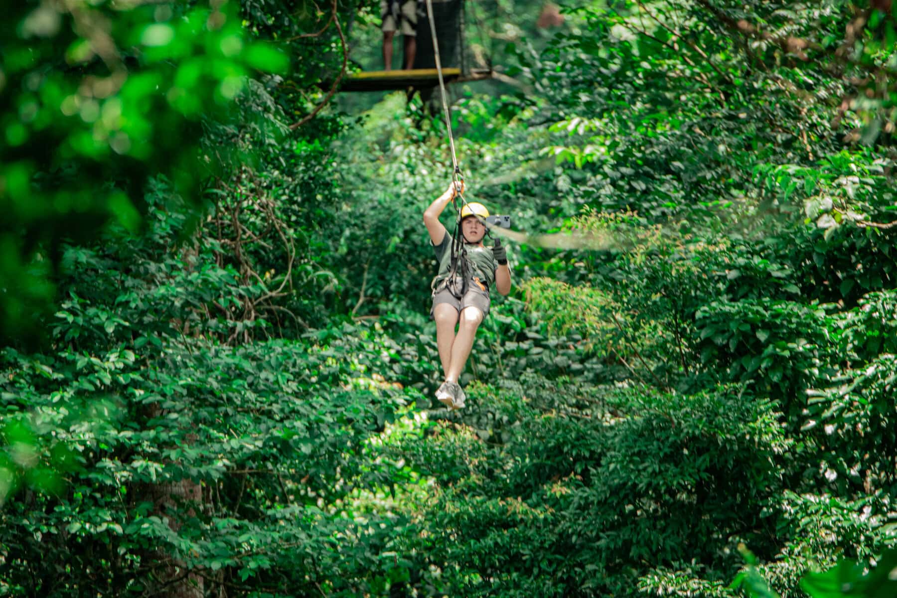happy customer on canopy tour.jpg scaled