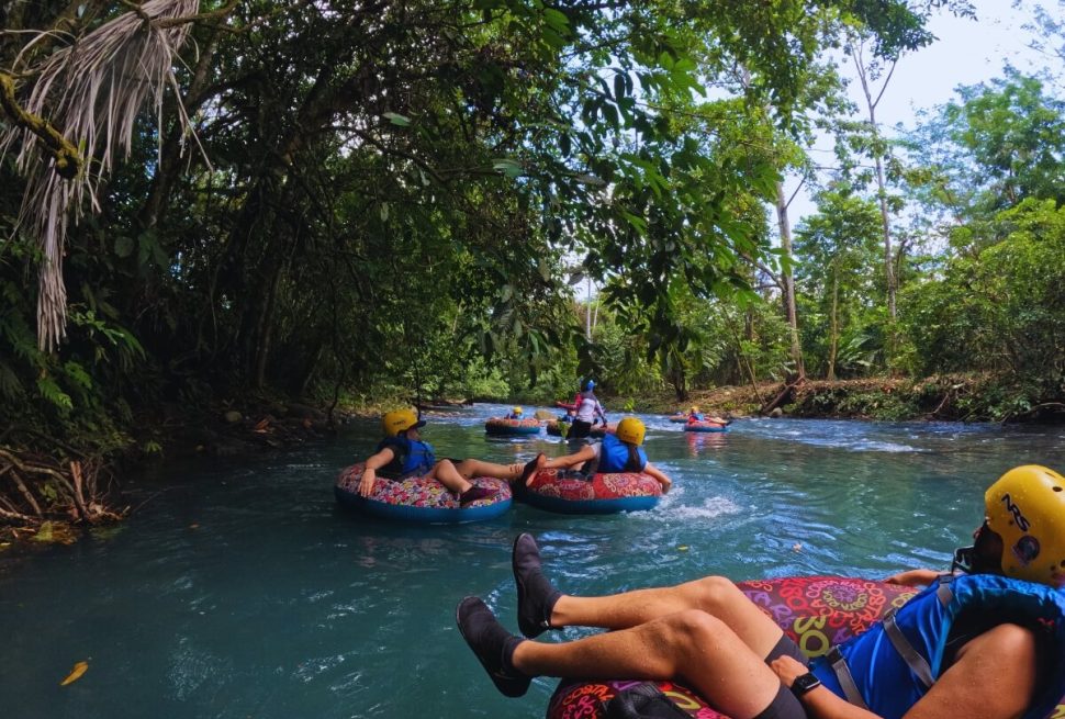 people on tubes in a river