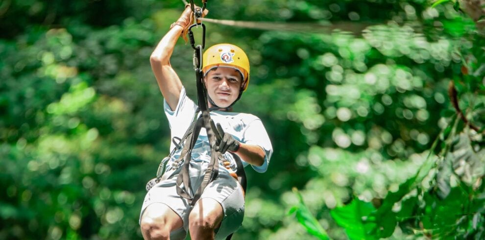 ziplining through the forest rio celeste.jpg